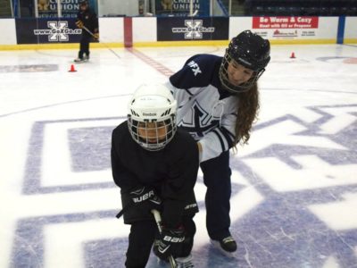 Making adjustments on the ice