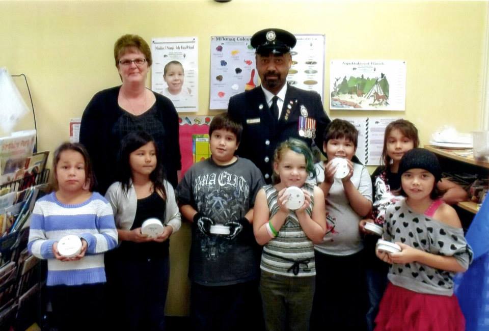 Tilda Raney with students at the first School Smoke Detector Program