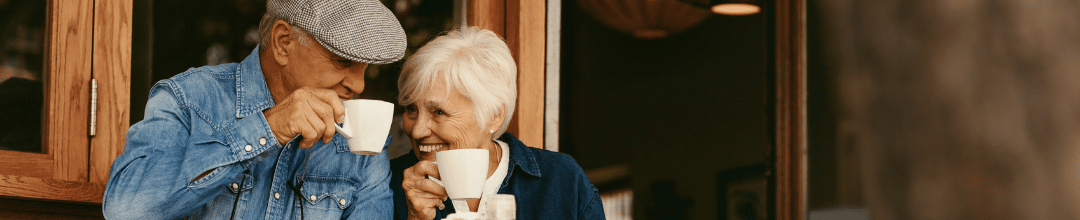 An old couple enjoying coffee